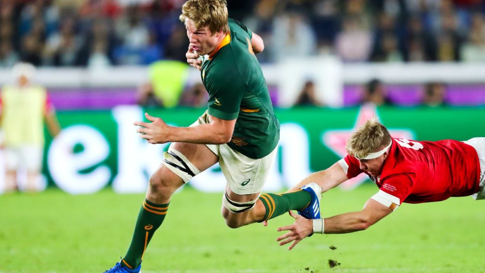 27th October 2019, Oita, Japan;  Pieter-Steph Du Toit (RSA) evades the flying tackle; 2019 Rugby World Cup Semi-final match between Wales 16-19 South Africa at International Stadium Yokohama in Yokohama, Kanagawa, Japan.