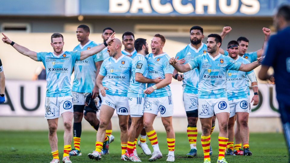USAP team celebrating the win  during the Top 14 match between Union Sportive Arlequins Perpignanais and Racing 92 at Stade Aime Giral on February 3, 2024 in Perpignan, France. (Photo by Baptiste Lhuilier/Icon Sport)