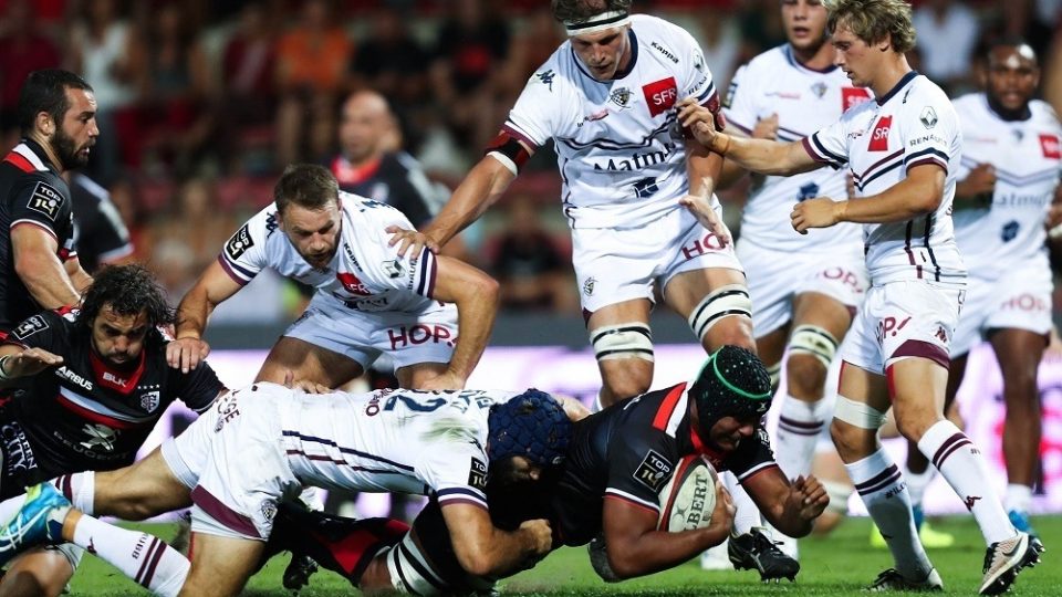 Thierry Dusautoir of Toulouse is tackled by Julien Rey of Bordeaux during the French Top 14 between Toulouse and Bordeaux-Begles at Stade Ernest Wallon on August 27, 2016 in Toulouse, France. (Photo by Manuel Blondeau/Icon Sport)