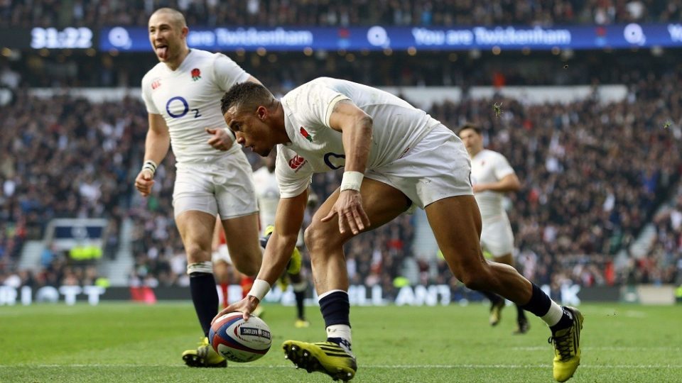 England's Anthony Watson scores his side's first try of the day during the 2016 RBS Six Nations match at Twickenham Stadium, London.