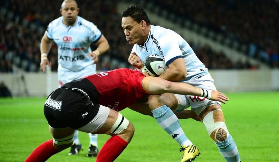 (R-L) Chris Masoe Of Racing 92 takes on Charles Ollivon of Toulon during the French Top 14 rugby union match between Racing 92 v RC Toulon at Stade Pierre Mauroy on March 26, 2016 in Lille, France.